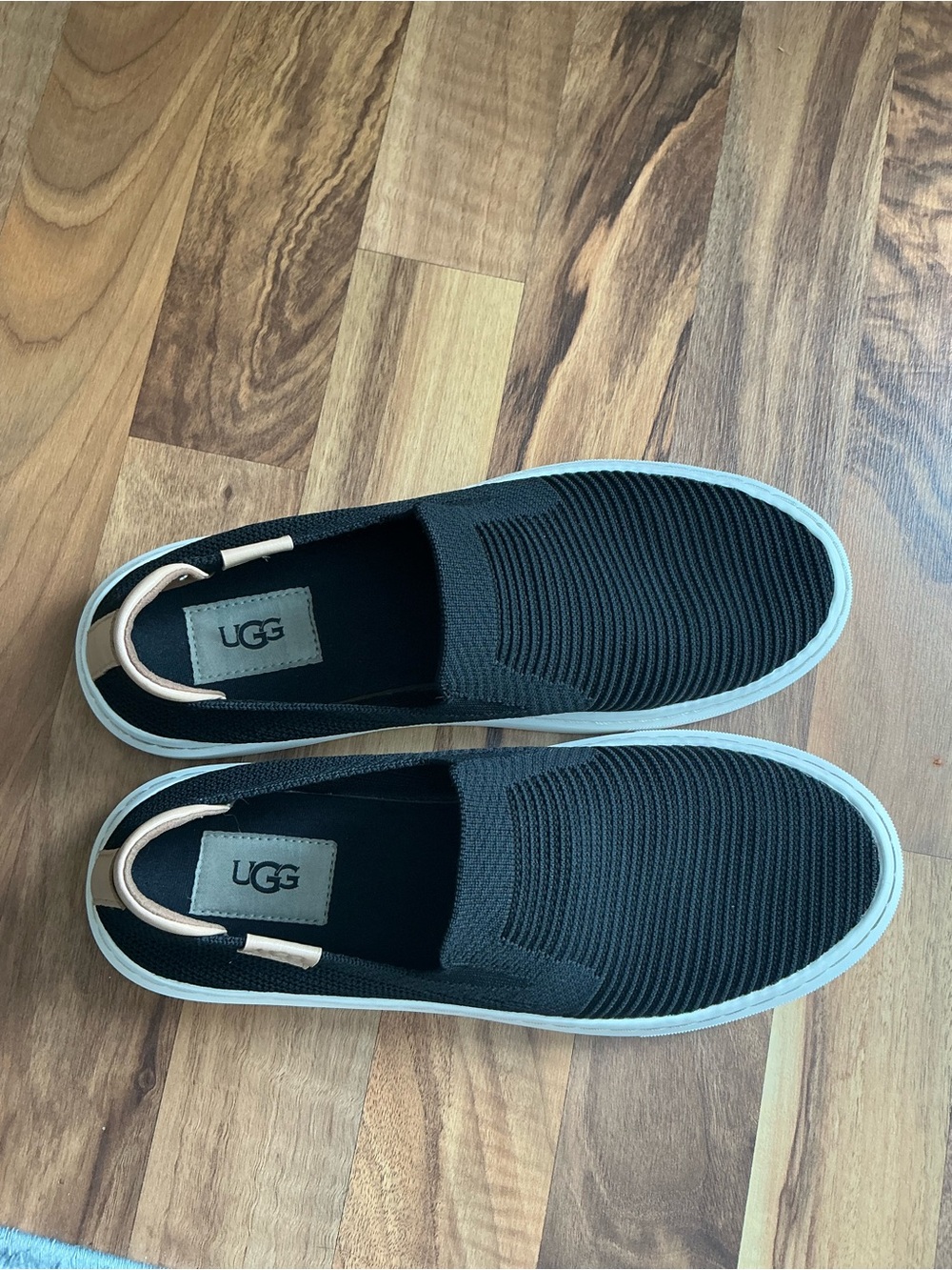 UGG Women’s Black Slip-On Knit Sneakers with White Sole